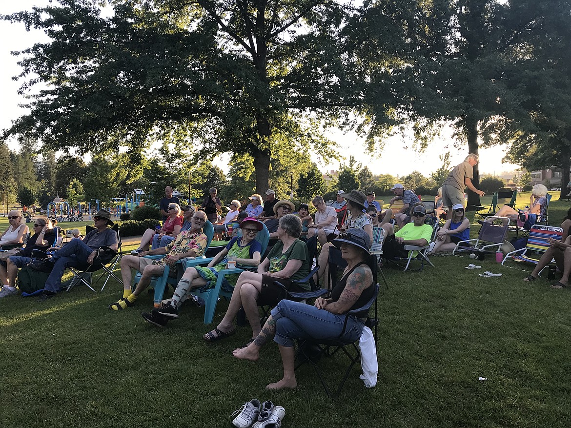 A crowd gathers on the lawn of the Coeur d'Alene Public Library to enjoy a July 11 performance by Cosmic Wagon. Music on Mondays concerts are held each Monday through the summer from 6 to 7:30 p.m.