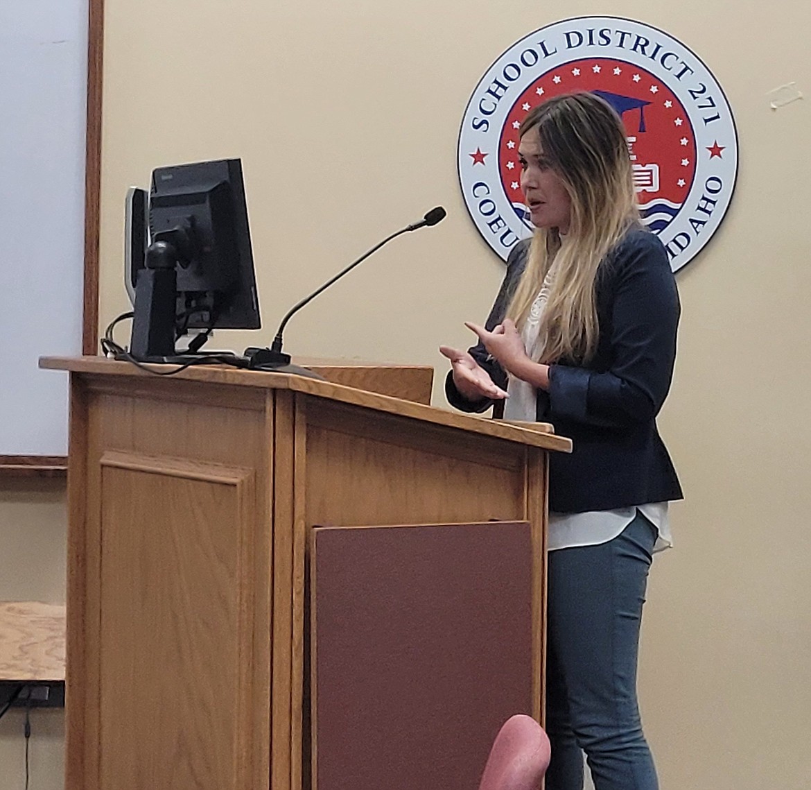 Coeur d'Alene School District Director of Finance Shannon Johnston speaks to Coeur d'Alene School Board trustees Monday evening during a regular meeting and amended budget public hearing.