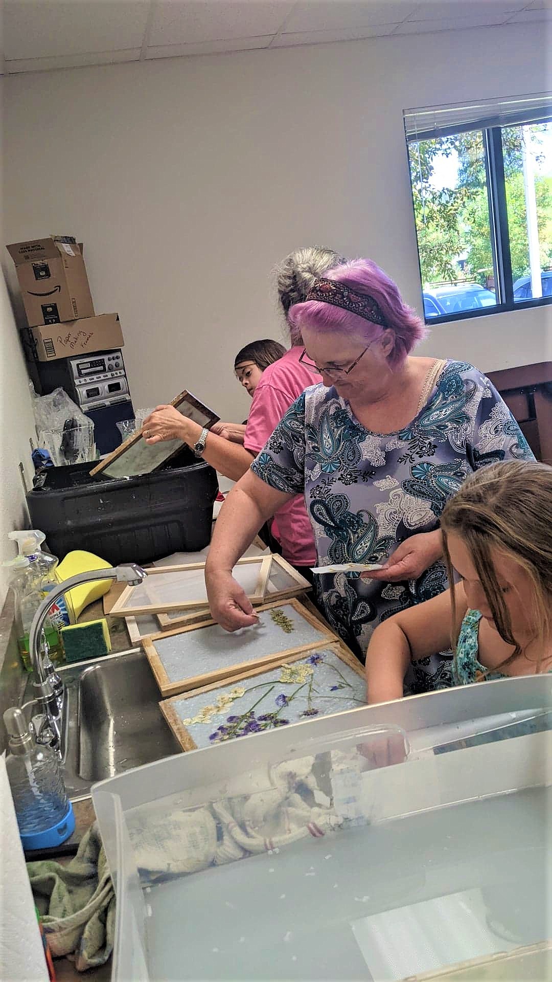 James Driscoll, Melissa Driscoll, Mary Sawyer and Rory Pileggi were part of the group for Tuesday afternoon's papermaking class at the Pinehurst Library.