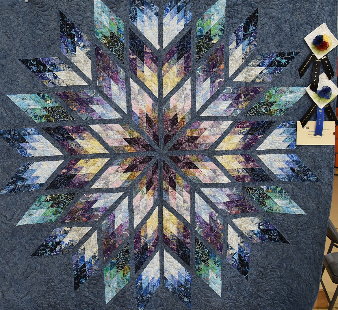 Susy Corneliusen’s quilt titled Prismatic Star won Best in Show. (Marla Hall/Lake County Leader)