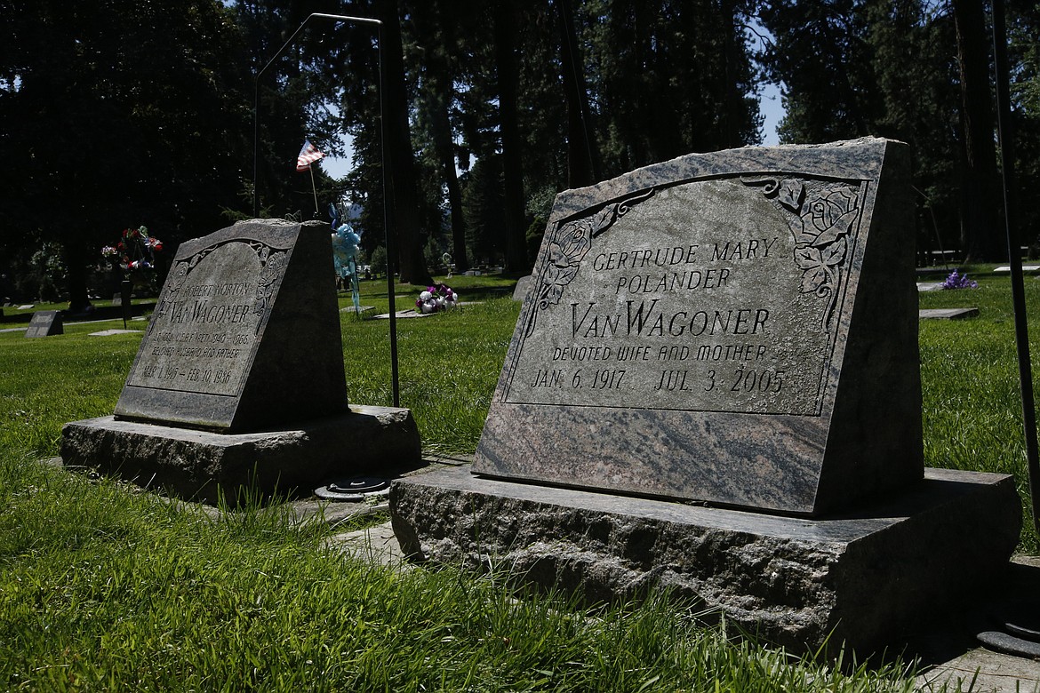 In Forest Cemetery, the graves of Robert and Gertrude Van Wagoner sit unadorned after decorations were repeatedly disturbed. KAYE THORNBRUGH/Press