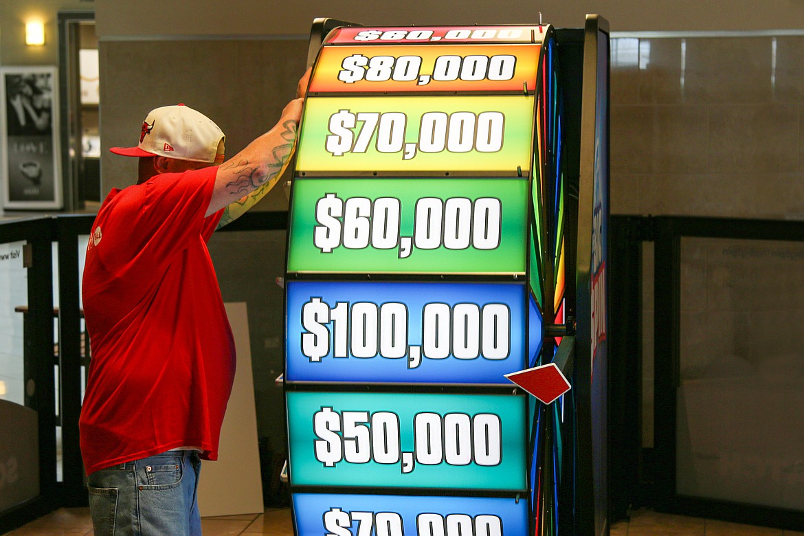 Lonnie Dahl gets ready to spin the wheel in the Big Spin lottery game, launched July 18 by the Idaho Lottery. Five more chances are out there to claim a spot at the wheel and try your luck.