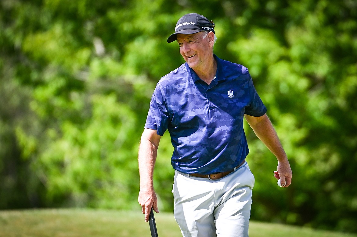 Gene Walsh smiles after sinking a long birdie putt on the 12th hole during the Montana State Senior Golf Tournament at Buffalo Hill Golf Club on Thursday, Aug. 4. (Casey Kreider/Daily Inter Lake)