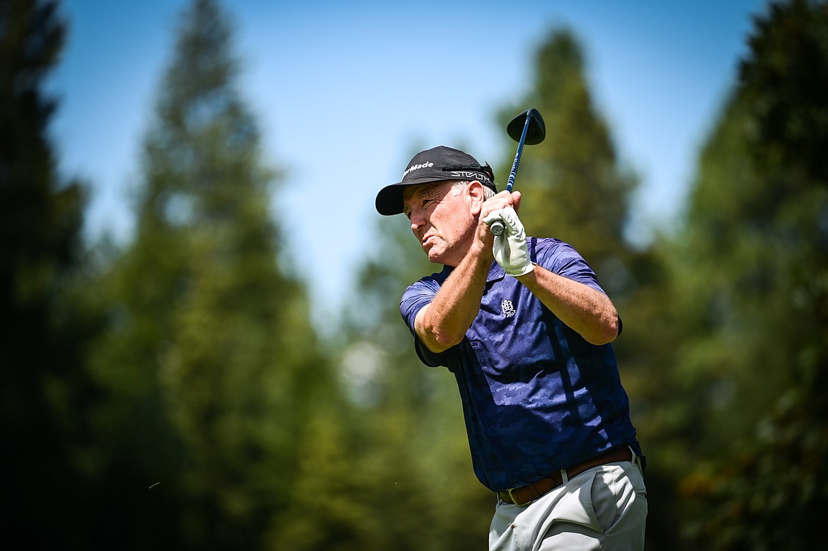 Gene Walsh watches his drive on the 13th tee during the Montana State Senior Golf Tournament at Buffalo Hill Golf Club on Thursday, Aug. 4. (Casey Kreider/Daily Inter Lake)