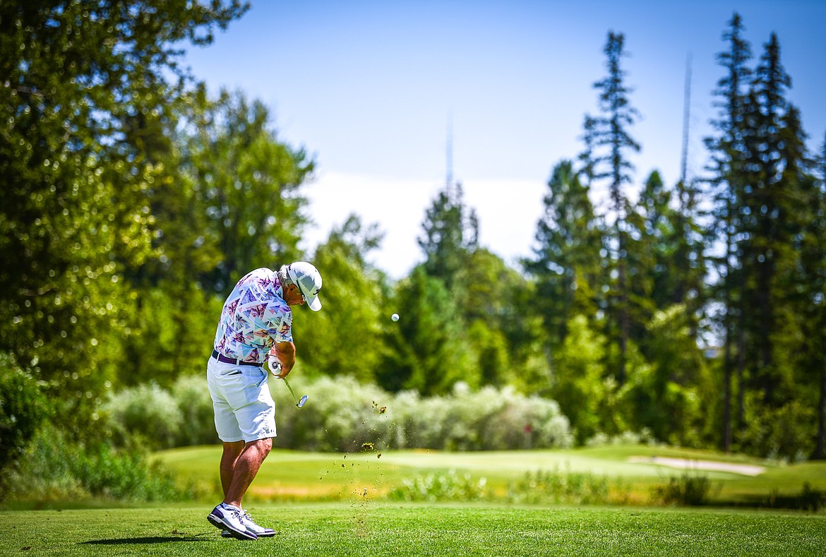 Brad Grattan hits his tee shot on the 16th hole during the Montana State Senior Golf Tournament at Buffalo Hill Golf Club on Thursday, Aug. 4. (Casey Kreider/Daily Inter Lake)