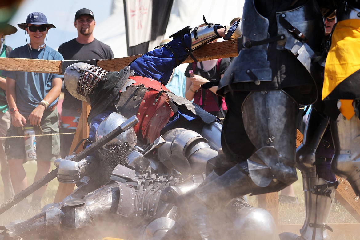 Knights in full armor give a demonstration of medieval fighting techniques at the Montana Renaissance Faire at the Majestic Valley Arena Saturday, July 30. (Jeremy Weber/Daily Inter Lake)