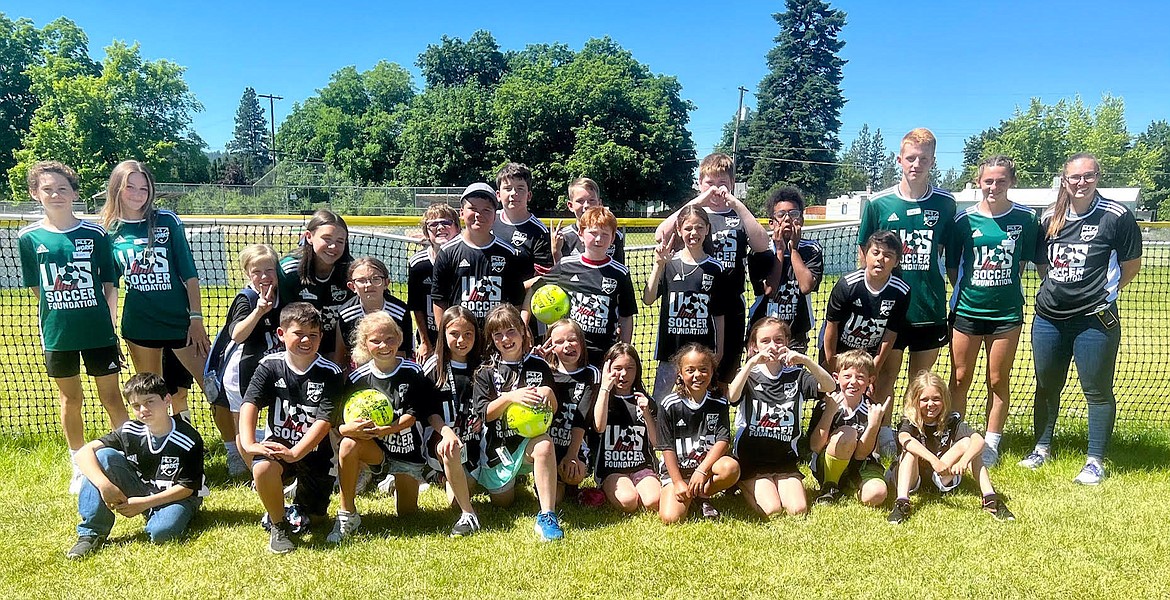 Soccer for Success participants strike a pose on the field at the Boys and Girls Club in Post Falls.