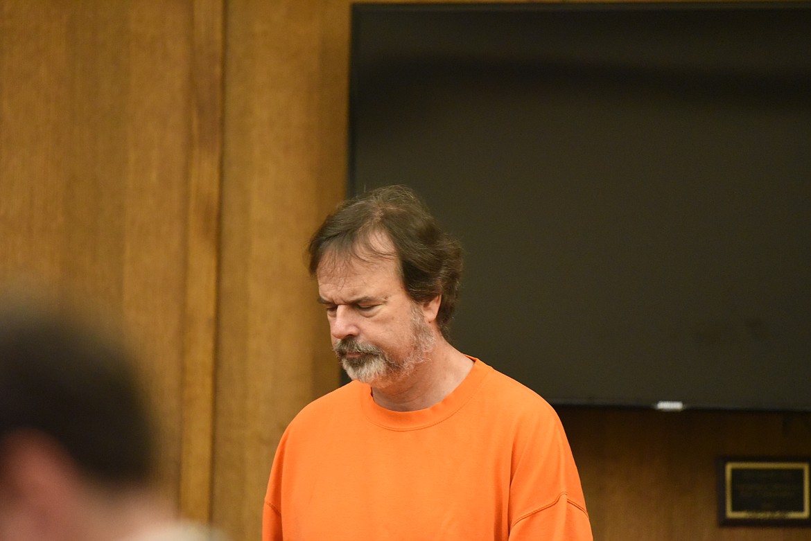 Local artist Nicholas Oberling makes his way to the defendant's table for his arraignment in Flathead County District Court on Thursday, Aug. 4, 2022. (Derrick Perkins/Daily Inter Lake)