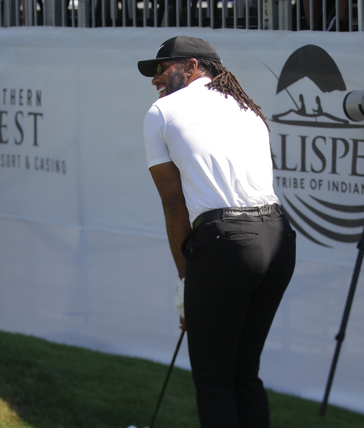 JASON ELLIOTT/Press
Former Arizona Cardinals wide receiver Larry Fitzgerald attempts to hit away from the sponsors area of the 18th hole at The Showcase golf exhibition at The Coeur d'Alene Resort Golf Course.