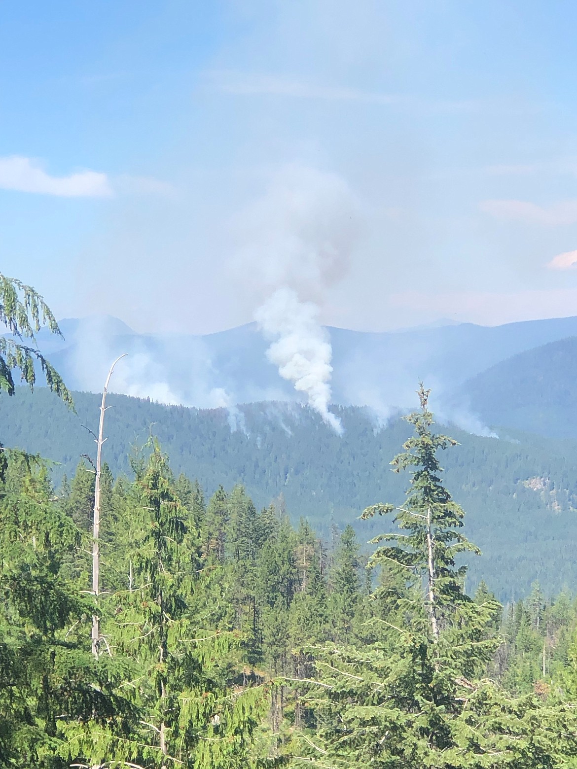 Smoke from the Diamond Watch Fire can be seen from the Priest Lake area. the fire, now at 120 acres, is burning in Pend Oreille County, Wash.