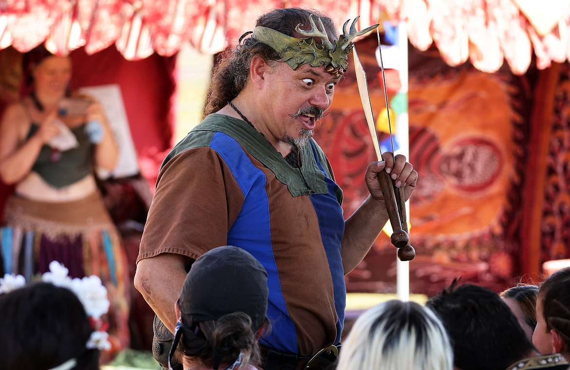Pyro juggler Thomas Wood entertains the crowd with his skills at the Montana Renaissance Faire on the grounds of the Majestic Valley Arena Saturday, July 30. (Jeremy Weber/Daily Inter Lake)