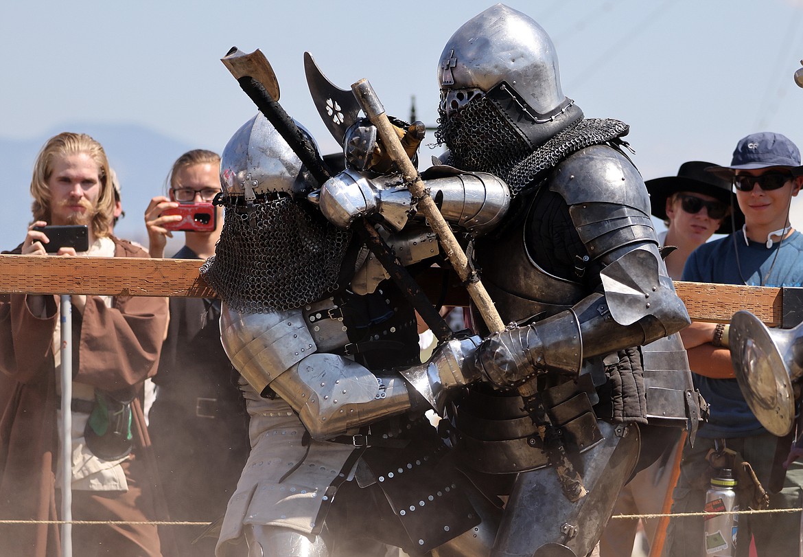 Knights in full armor give a demonstration of medieval fighting techniques at the Montana Renaissance Faire at the Majestic Valley Arena Saturday, July 30. (Jeremy Weber/Daily Inter Lake)