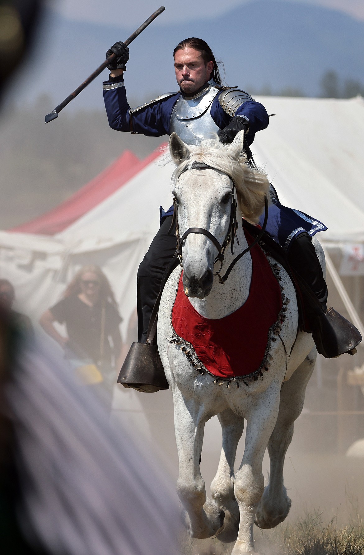 A knight prepares to spear his target at the Montana Renaissance Faire on the grounds of the Majestic Valley Arena Saturday, July 30. (Jeremy Weber/Daily Inter Lake)