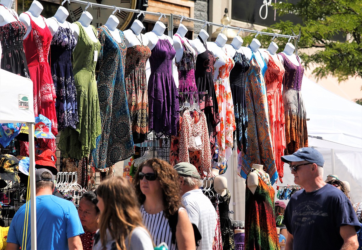 Dresses decorate Sherman Avenue during the Street Fair on Friday.