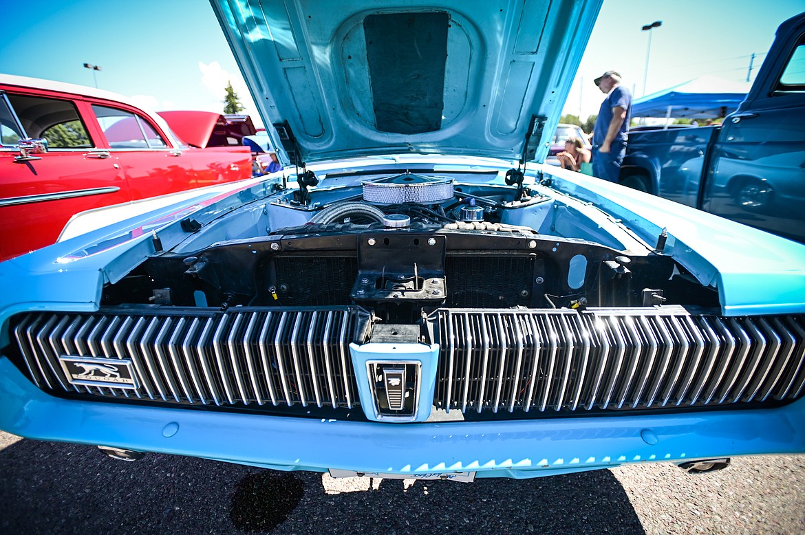 Front grill and under the hood of Jordan Davis' 1967 Mercury Cougar at the Evergreen Show 'N Shine car show at Conlin's Furniture on Saturday, Aug. 6. (Casey Kreider/Daily Inter Lake)