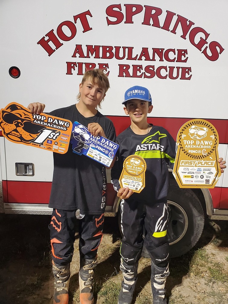 Ryder Larsen and Jayten Erikson with awards at the Top Dawg races. (Tracy Scott/Valley Press)