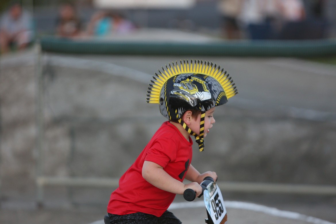 There were races for all ages on Saturday night, as seen by this young rider competing in the strider race.