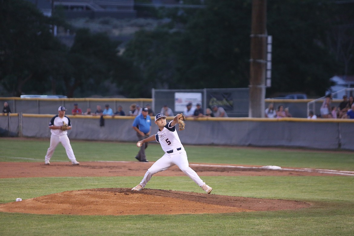 KUBA Kings pitcher Dante Claudio goes through his pitching motion against the Riverdogs on August 6, 2022.