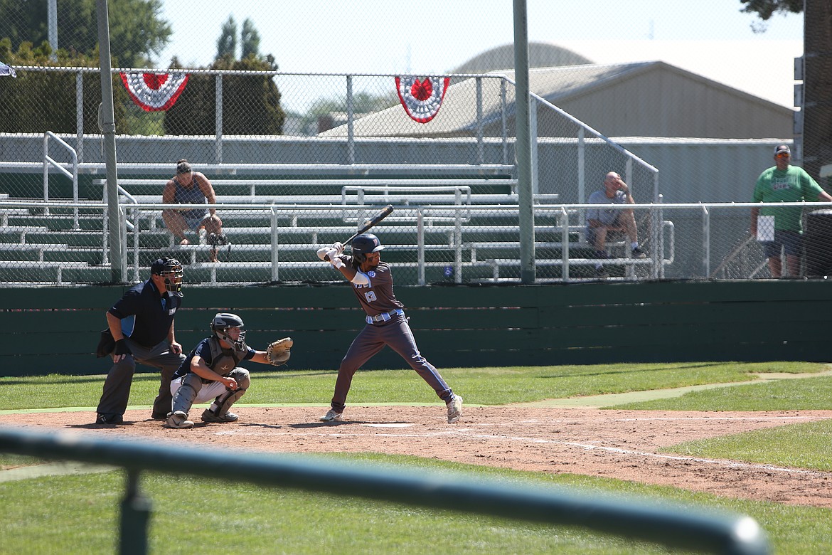 Northwest Bakersfield’s Noah Brum waits in the batter’s box for a pitch against Farmers Baseball.