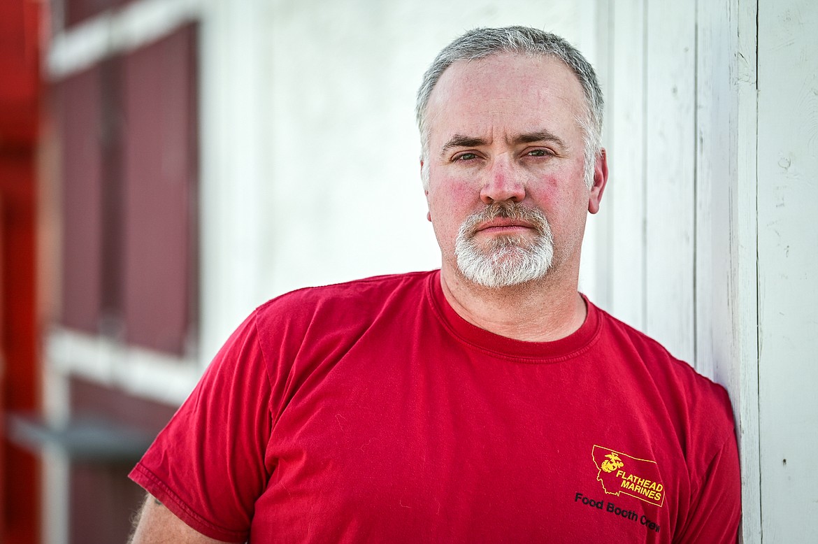 Arthur Woolley outside the Flathead Marines stand at the Flathead County Fairgrounds on Tuesday, Aug. 9. (Casey Kreider/Daily Inter Lake)