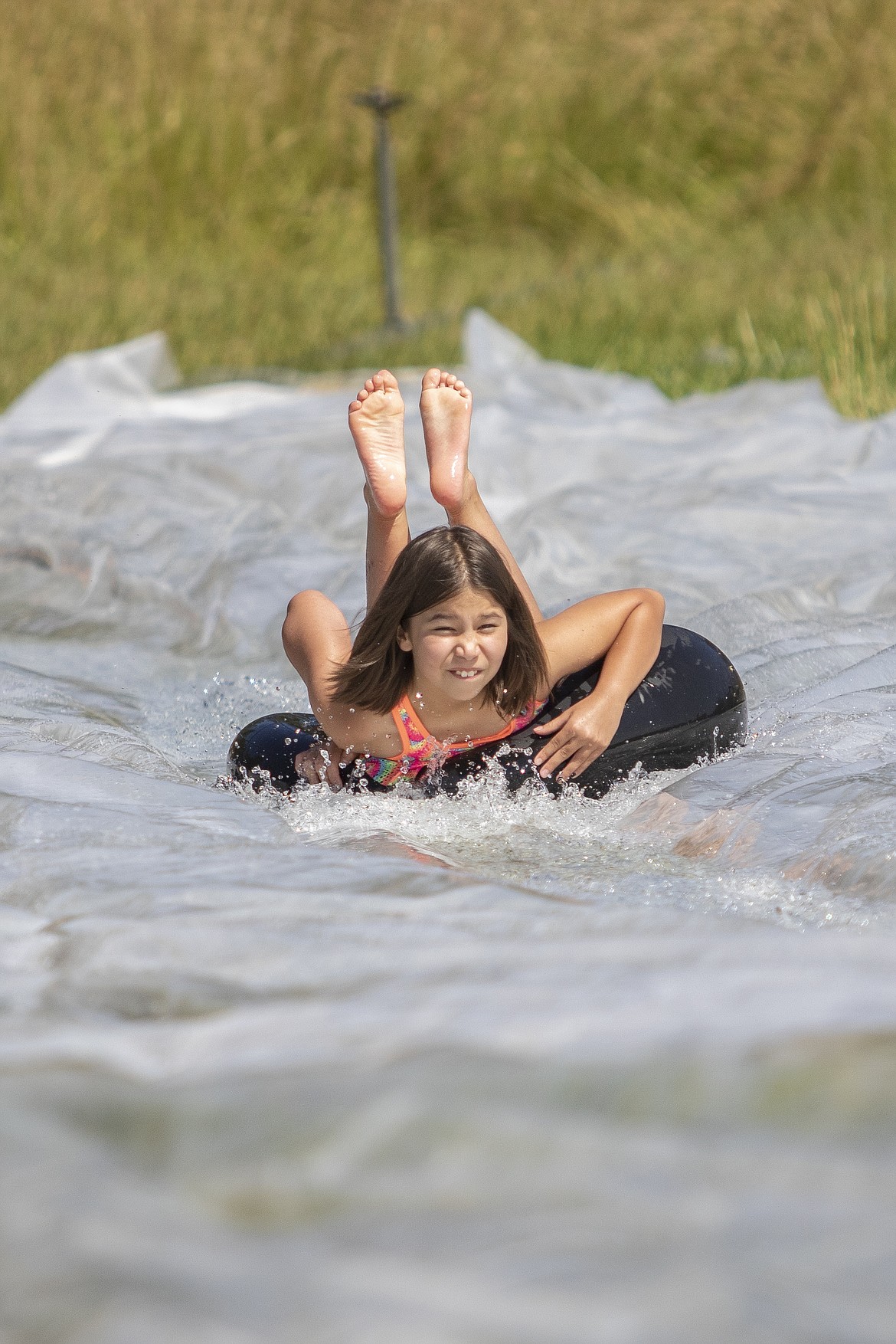 Ember Weaver-Ashley races down the hill. (Rob Zolman/Lake County Leader)