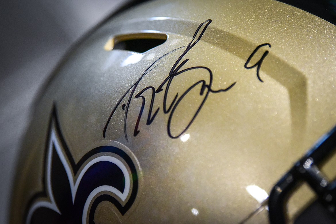 Former NFL quarterback Drew Brees' autograph on a New Orleans Saints helmet at the World Gym Cares Fair on Wednesday, Aug. 10. (Casey Kreider/Daily Inter Lake)