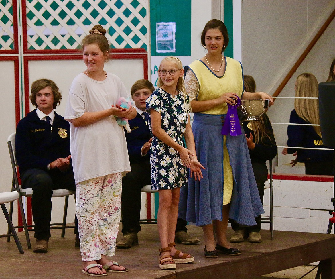 4H members had a style review of their sewing products and modeled their creations at the Opening Ceremonies. (far right) Alexis Davy was named Grand Champion for her Sewing Expressions.