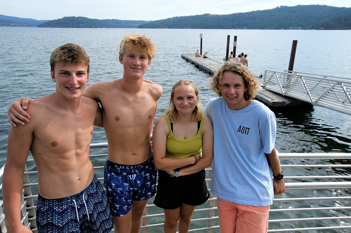 Four local teens, from left, Garrett Leonard, Preston DeMarre, Lucy Mendez and Lane Stidham, helped save two people who nearly drowned at North Idaho College beach on Tuesday