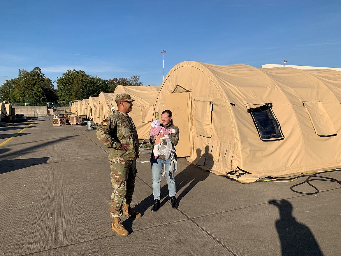 U.S. Air Force Maj. Chad Everett with his wife, Katya, on the day the last of the Afghan refugees left Ramstein Air Base in Germany. (Photo courtesy Maj. Chad Everett)