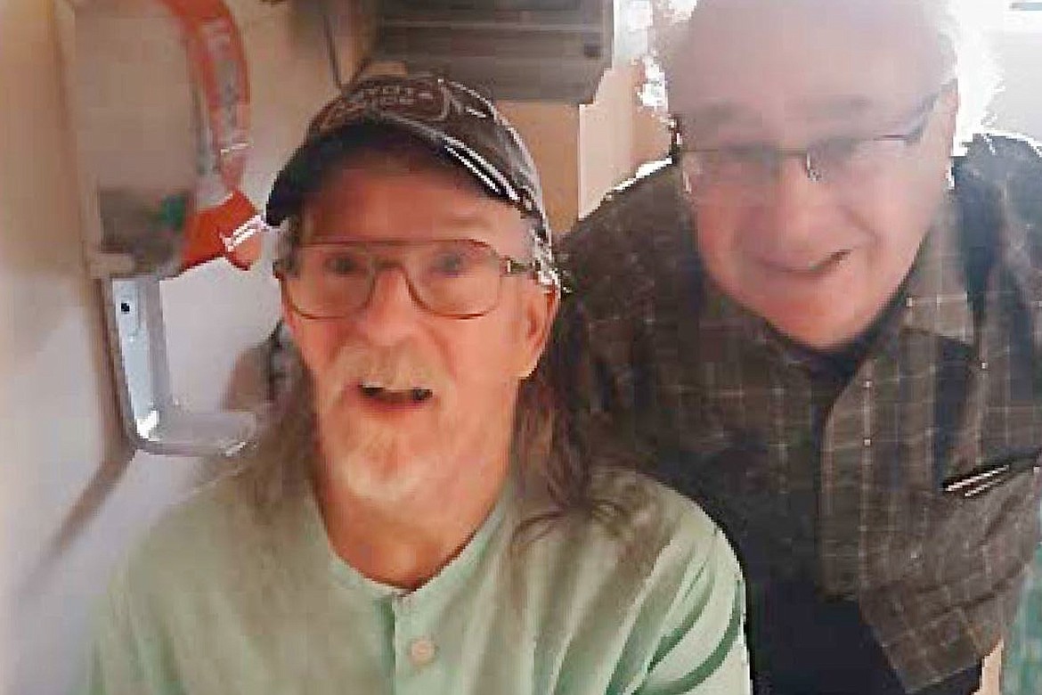 This photo provided by Gary Nichols shows him, right, with his brother, Alan, on the eve of his euthanization in Chilliwack, British Columbia, Canada, in July 2019. Alan submitted a request to be euthanized and he was killed, despite concerns raised by his family and a nurse practitioner.Nichols’ family reported the case to police and health authorities, arguing that he lacked the capacity to understand the process and was not suffering unbearably — among the requirements for euthanasia. “Alan was basically put to death,” his brother, Gary, says. (Courtesy Gary Nichols via AP)