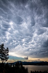 Mammatus clouds hang over Lake Coeur d'Alene Thursday in advance of major thunderstorms that moved into the area around 5:30 p.m. 

Mammatus is a cellular pattern of pouches hanging underneath the base of a cloud, typically a cumulonimbus raincloud.