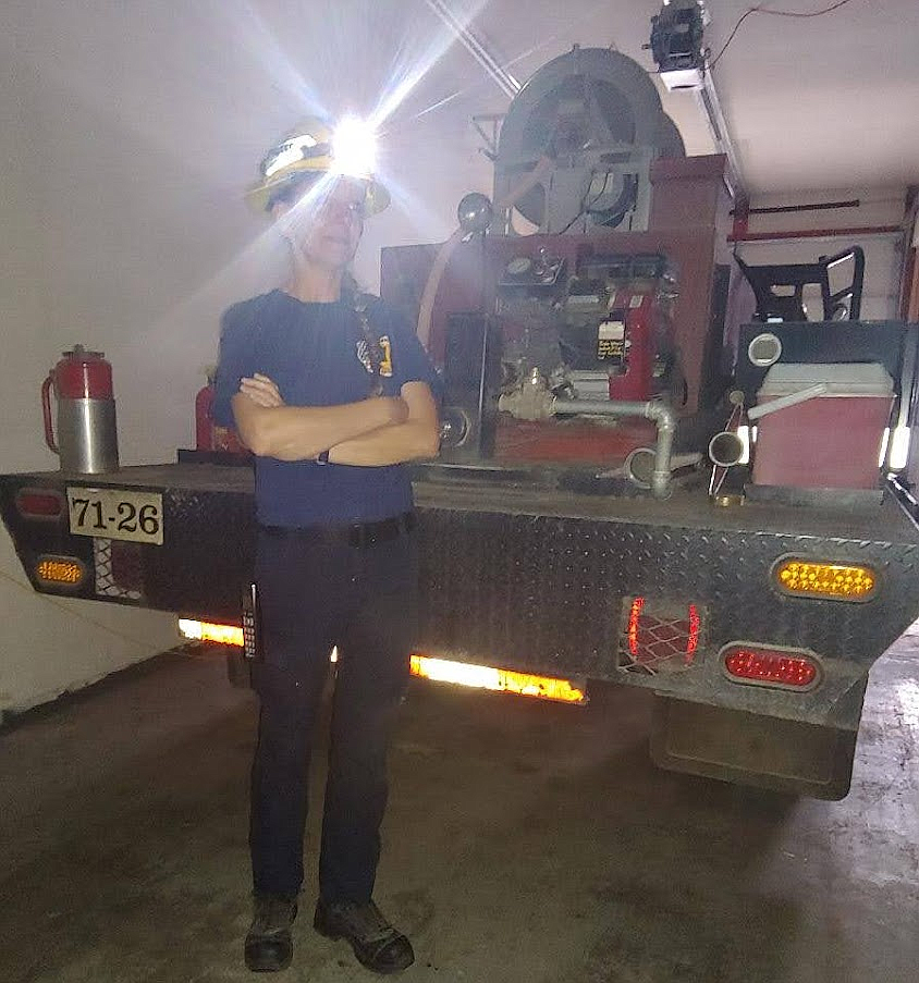 Grant County Fire District 7 volunteer firefighter Jane Chambers sports one of the new headlamps the district just received through a grant from the Columbia Basin Foundation.