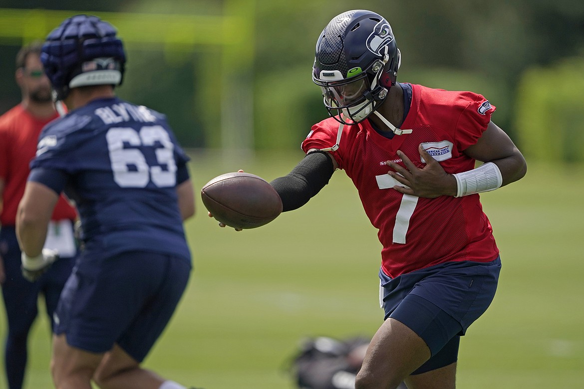 Seahawks QBs Lock, Smith hope for edge in preseason opener