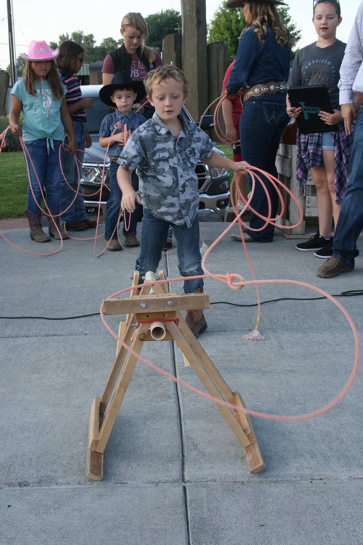 Buck Brumet ropes his steer in the Pee Wee Stampede roping contest at the annual Cowboy Breakfast Friday.