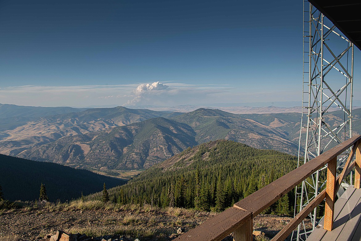 A smoke plume from the Elmo 2 Fire west of Flathead Lake is seen from the Patrick's Knob fire lookout on the Lolo National Forest. (Tracy Scott/Valley Press)