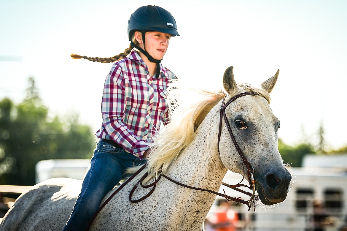 Claire St. Jean lopes her horse around the arena during junior level bareback equitation at the 4-H Horse Show at the Northwest Montana Fair on Saturday, Aug. 13. (Casey Kreider/Daily Inter Lake)
