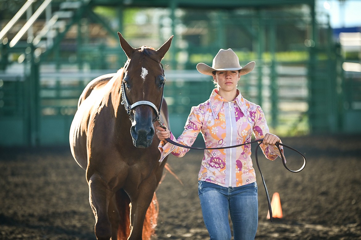 Rachel Brannan leads her horse through the pattern during junior level showmanship at the 4-H Horse Show at the Northwest Montana Fair on Saturday, Aug. 13. (Casey Kreider/Daily Inter Lake)