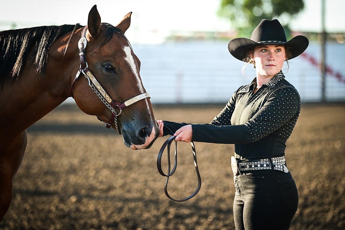 Zoe Guffin stands with her horse during senior level showmanship at the 4-H Horse Show at the Northwest Montana Fair on Saturday, Aug. 13. (Casey Kreider/Daily Inter Lake)