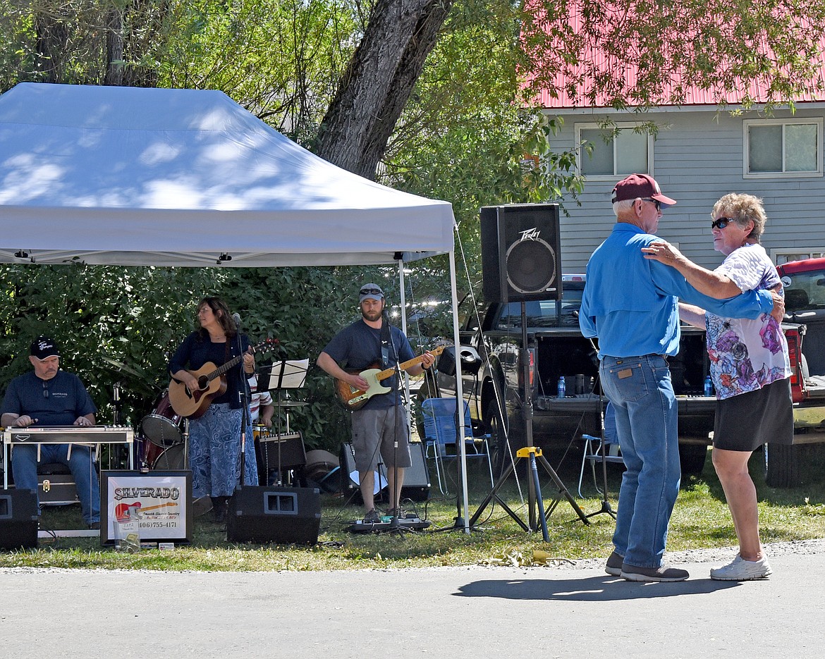 This couple kept perfectly in time with the music and in step with each other as the Silverado band entertained festival-goers. (Marla Hall/Lake County Leader)