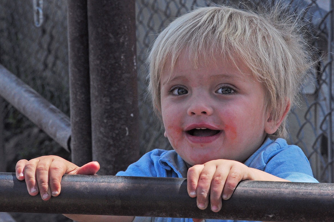 This little tyke was having a grand day as both a spectator and participant at the Kiddie Slicker Rodeo. (Marla Hall/Lake County Leader)