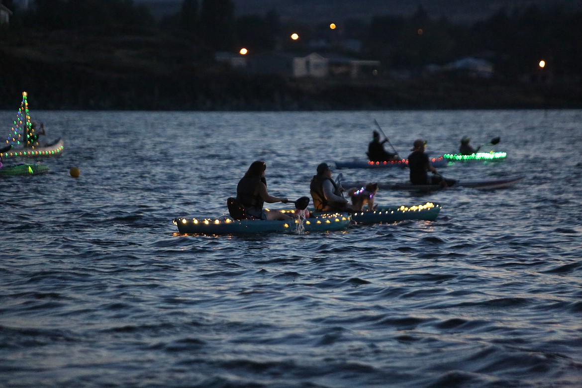 The Moonlight Paddle hit the waters of Soap Lake on Saturday, lighting up Soap Lake after sunset.