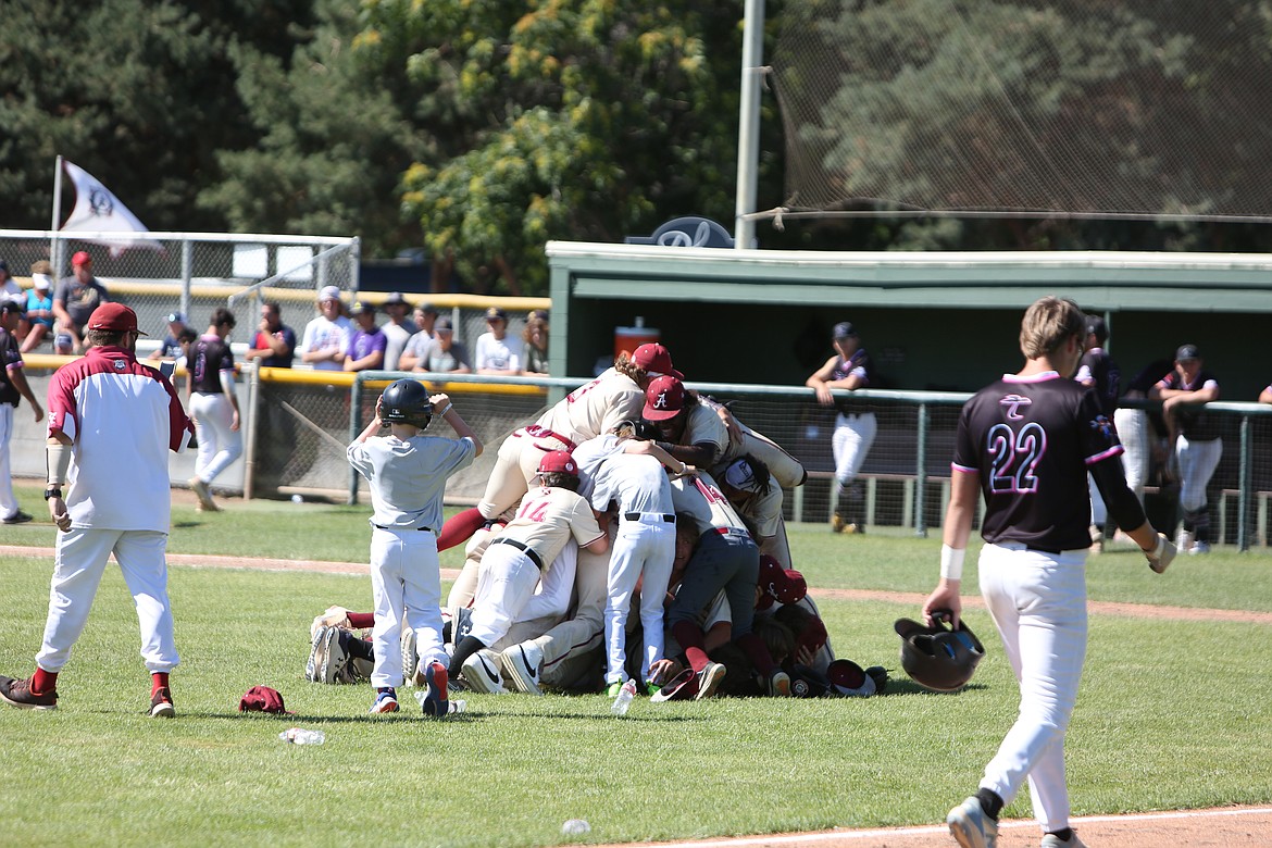 The Alabama Rawdogs finished their World Series appearance with a championship, dogpiling on the infield after the win.