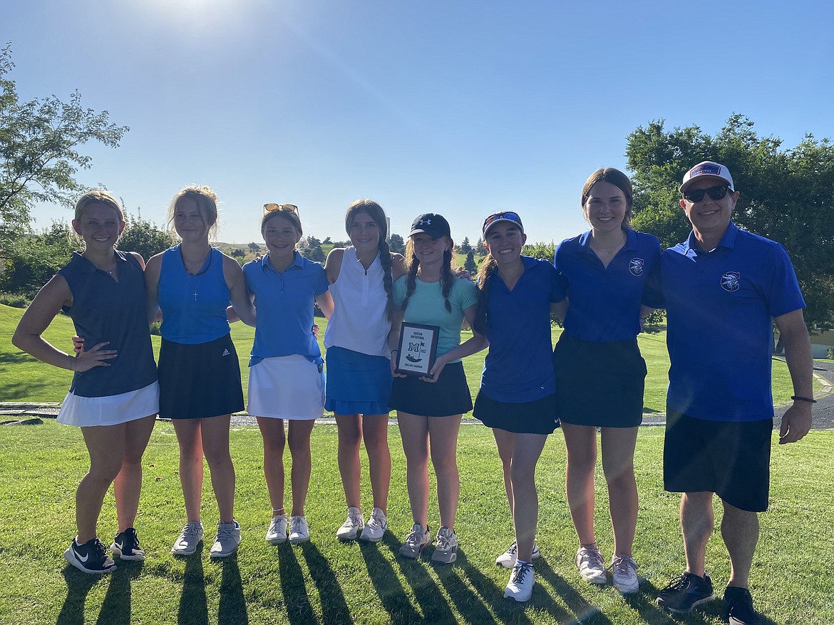 Courtesy photo
The Coeur d'Alene High girls golf team won the Moscow Invitational on Monday at the University of Idaho Golf Course. From left Ava Yates, Addie Garcia, Stella Dietz, Sophia Vignale, Mady Riley, Hayden Crenshaw, Peyton Blood and girls coach Jeff Lake.