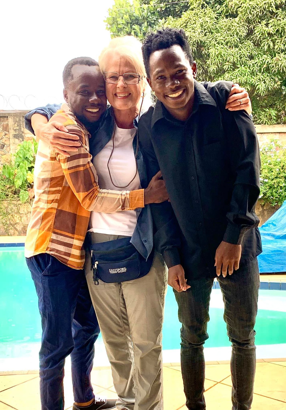 Deno has forged a close bond with Kakembo and Joseph, two brothers who run an orphanage in Mityana, Uganda. She recently met the pair in person for the first time. Courtesy photo.