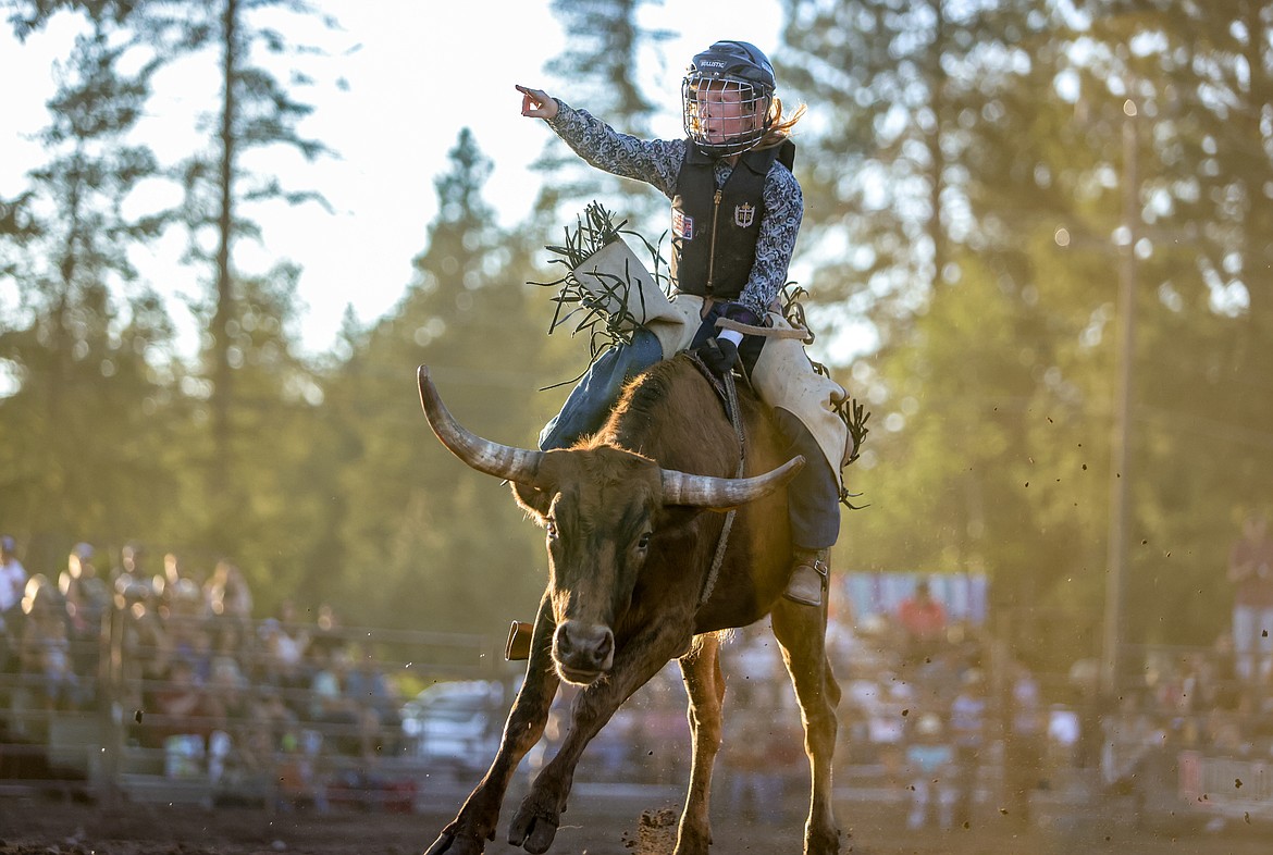 A young bull rider points to the crowd after a good ride at the Bull Bash. (JP Edge photo)