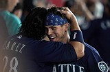 Mariners break up perfect game bid in 6th, beat Angels 8-2