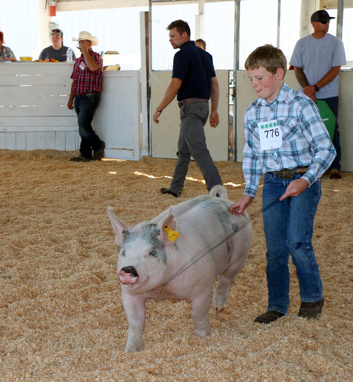 Easton Schmaltz of the Panhandle Pride Livestock 4-H Club shows his swine on Tuesday.