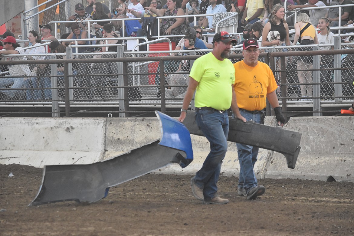 Parts of cars were removed from the track between heats by demo staff.