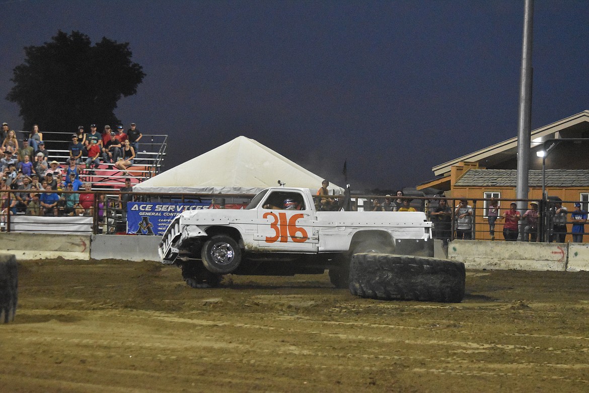 Many vehicles lifted a wheel or two off the ground when hitting one of the tires, another car or even just one of the many potholes formed in the track.