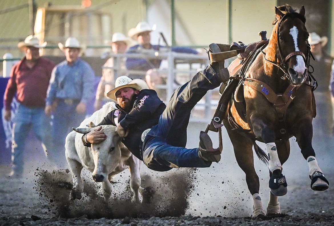 Clayton Hass, from Weatherford, Texas, competes in steer wrestling at the Northwest Montana Fair & Rodeo on Thursday, Aug. 18. (Casey Kreider/Daily Inter Lake)